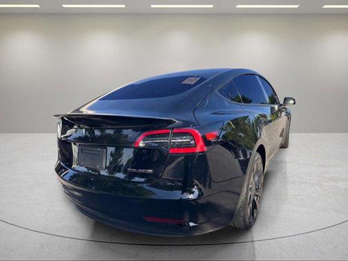 Solid Black 2023 Tesla Model 3 Performance