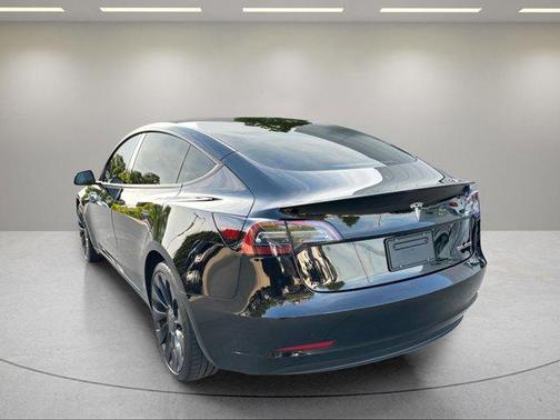 Solid Black 2023 Tesla Model 3 Performance