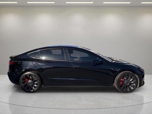 Solid Black 2023 Tesla Model 3 Performance