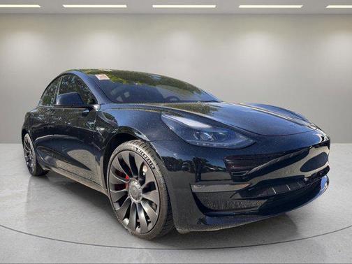Solid Black 2023 Tesla Model 3 Performance