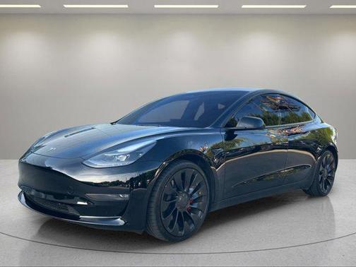 Solid Black 2023 Tesla Model 3 Performance