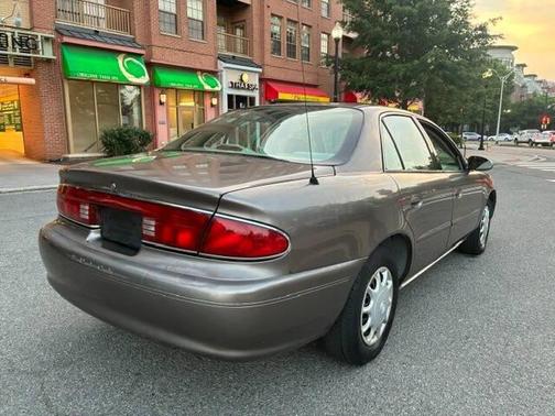 Tan 2004 Buick Century Standard 4dr Sedan