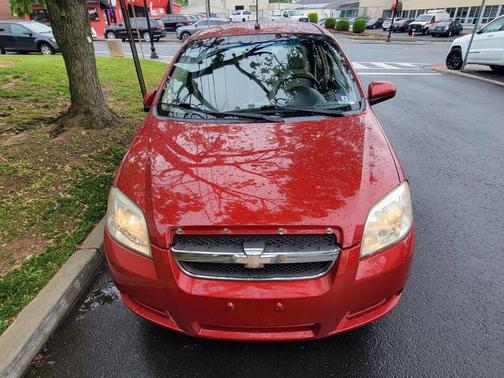Red 2011 Chevrolet Aveo LT