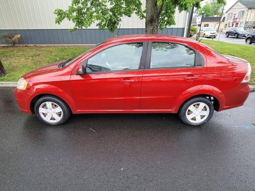 Red 2011 Chevrolet Aveo LT