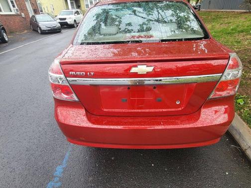 Red 2011 Chevrolet Aveo LT