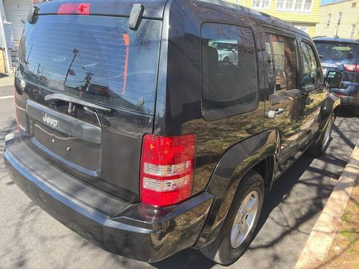 Brilliant Black Crystal Pearlcoat 2012 Jeep Liberty Sport