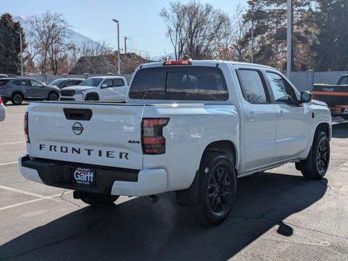 Glacier White 2026 Nissan Frontier SV