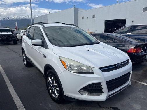 Ruby Red Metallic Tinted Clearcoat 2015 Ford Escape SE