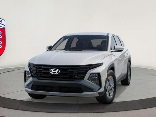 Creamy White Pearl 2026 Hyundai TUCSON Hybrid Blue SE