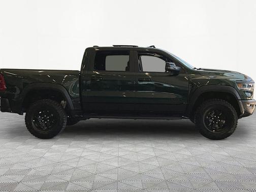 Serrano Green Metallic 2026 RAM 1500 RHO Crew Cab 4x4 5'7' Box