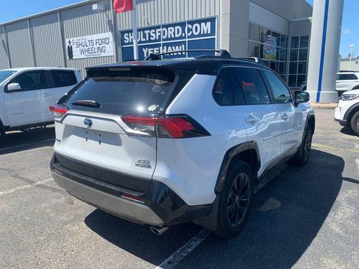Wind Chill Pearl/Midnight Black Metallic 2024 Toyota RAV4 Hybrid SE