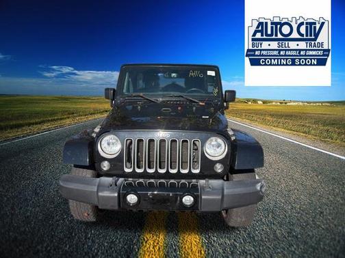 Black Clearcoat 2016 Jeep Wrangler Unlimited Sahara
