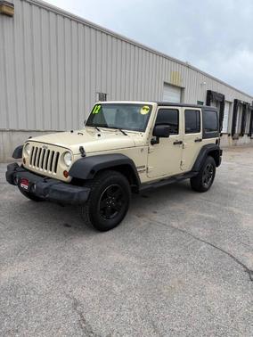 Tan 2012 Jeep Wrangler Unlimited Sport