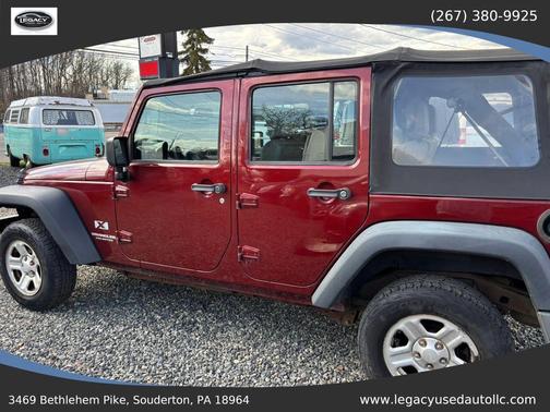 Red 2009 Jeep Wrangler Unlimited X