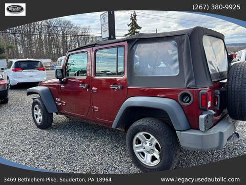 Red 2009 Jeep Wrangler Unlimited X