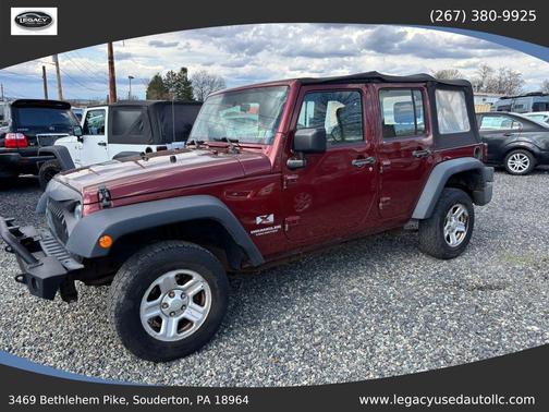 Red 2009 Jeep Wrangler Unlimited X