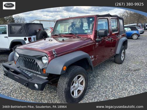 Red 2009 Jeep Wrangler Unlimited X