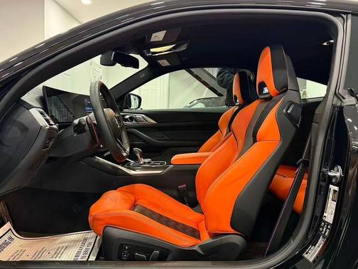 Black Sapphire Metallic 2025 BMW M4 Competition xDrive