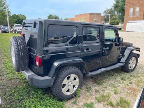 Black Forest Green Pearlcoat 2012 Jeep Wrangler Unlimited Sahara