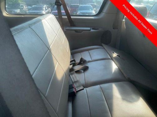 Tan 2003 Ford Excursion Limited