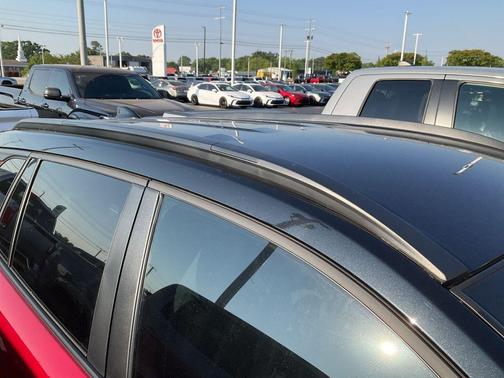 Soul Red Crystal/Jet Black 2025 Toyota Corolla Hybrid SE