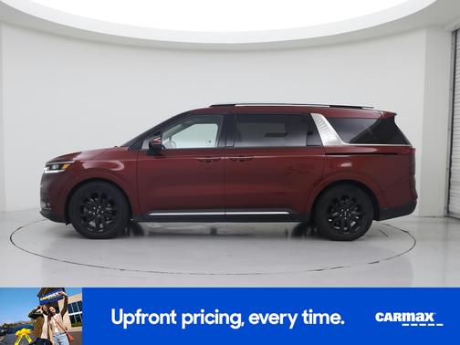 Red 2024 Kia Carnival SX Prestige