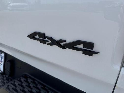 Bright White Clearcoat 2026 RAM 1500 RHO Crew Cab 4x4 5'7' Box