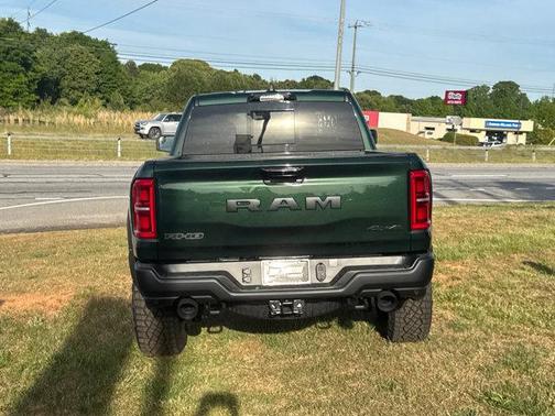 Serrano Green Metallic 2026 RAM 1500 RHO Crew Cab 4x4 5'7' Box