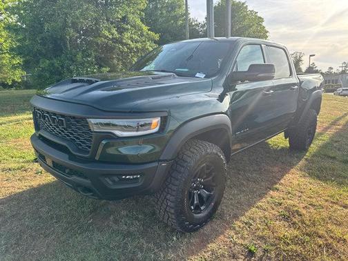 Serrano Green Metallic 2026 RAM 1500 RHO Crew Cab 4x4 5'7' Box
