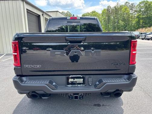 Diamond Black Crystal Pearlcoat 2026 RAM 1500 RHO Crew Cab 4x4 5'7' Box