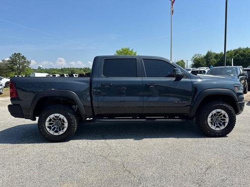 Forged Blue Metallic 2025 RAM 1500 RHO Crew Cab 4x4 5'7' Box
