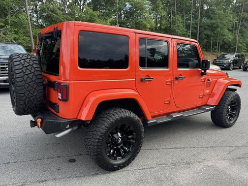 Sunset Orange Pearlcoat 2015 Jeep Wrangler Unlimited Sahara