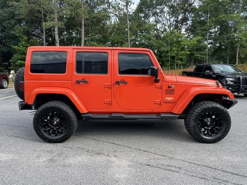Sunset Orange Pearlcoat 2015 Jeep Wrangler Unlimited Sahara