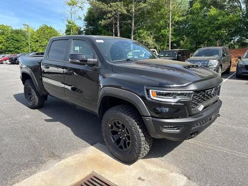 Diamond Black Crystal Pearlcoat 2026 RAM 1500 RHO Crew Cab 4x4 5'7' Box