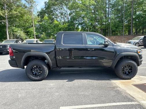 Diamond Black Crystal Pearlcoat 2026 RAM 1500 RHO Crew Cab 4x4 5'7' Box
