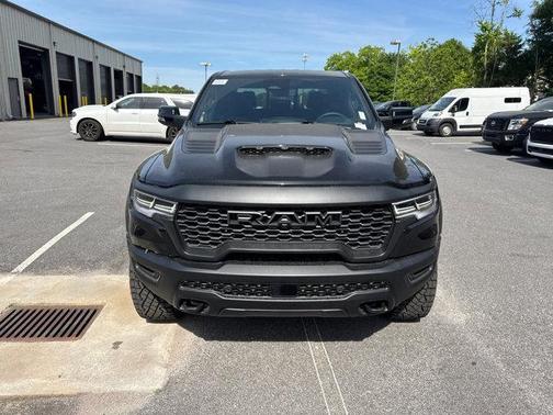 Diamond Black Crystal Pearlcoat 2026 RAM 1500 RHO Crew Cab 4x4 5'7' Box