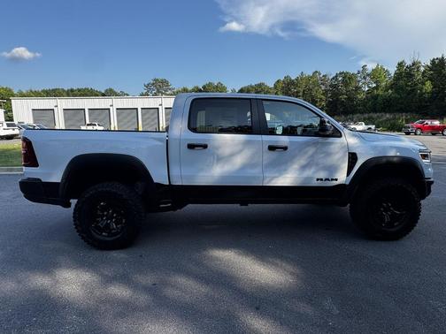 Bright White Clearcoat 2026 RAM 1500 RHO Crew Cab 4x4 5'7' Box