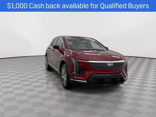 Radiant Red Tintcoat 2026 Cadillac OPTIQ Premium Luxury