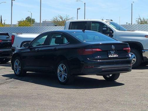 Deep Black 2024 Volkswagen Jetta 1.5T SE