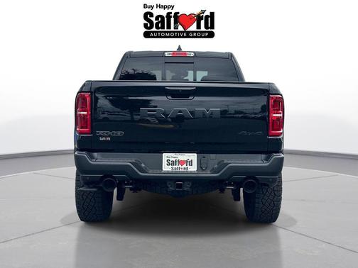 Diamond Black Crystal Pearlcoat 2026 RAM 1500 RHO Crew Cab 4x4 5'7' Box