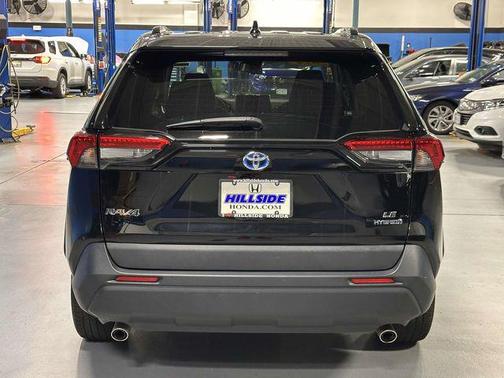 Midnight Black Metallic 2024 Toyota RAV4 Hybrid LE