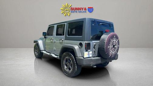 Silver 2013 Jeep Wrangler Unlimited Sport