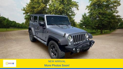 Silver 2013 Jeep Wrangler Unlimited Sport