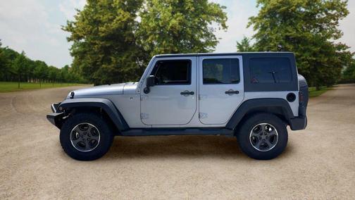 Silver 2013 Jeep Wrangler Unlimited Sport