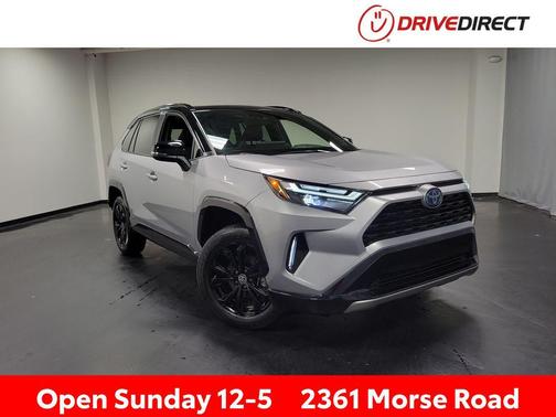 Silver Sky Metallic/Midnight Black Metallic 2023 Toyota RAV4 Hybrid SE