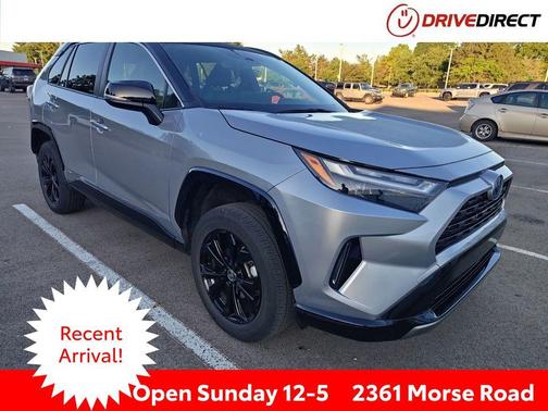 Silver Sky Metallic/Midnight Black Metallic 2023 Toyota RAV4 Hybrid SE