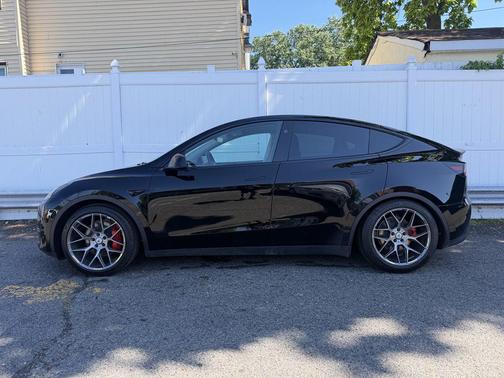 Solid Black 2023 Tesla Model Y Performance Dual Motor All-Wheel Drive