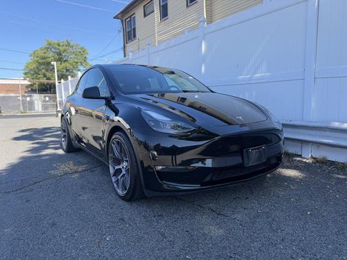 Solid Black 2023 Tesla Model Y Performance Dual Motor All-Wheel Drive