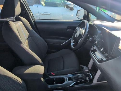 Jet Black 2024 Toyota Corolla Cross Hybrid SE