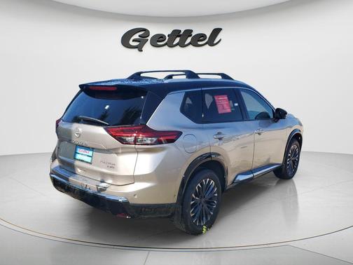 Champagne Silver Metallic/Super Black 2026 Nissan Rogue Platinum